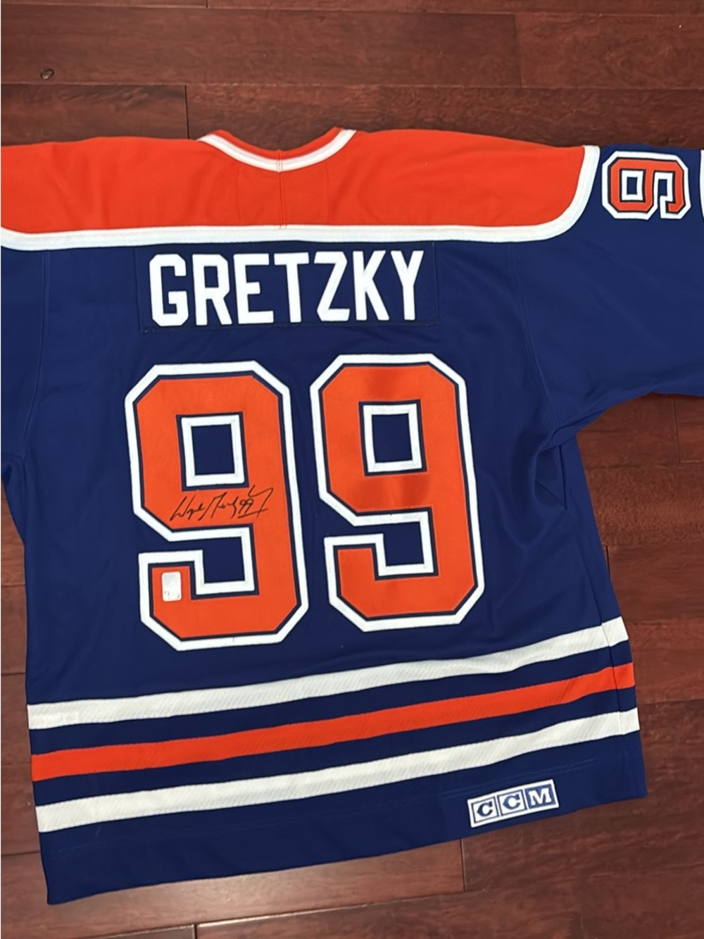 CCM Blue and Orange Edmonton Oilers Captain Hockey Jersey - Picture 3 of 5